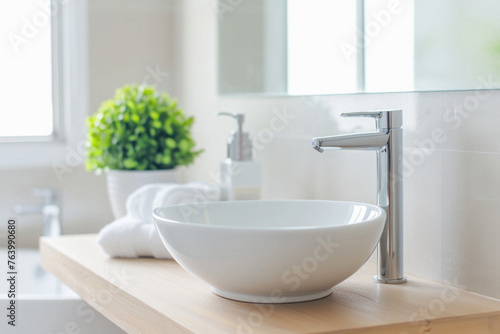 Bathroom sink with faucet interior home luxury minimal design washing furniture style. Modern stylish washbasin with tap in clean bath room in house or apartment contemporary decoration background.