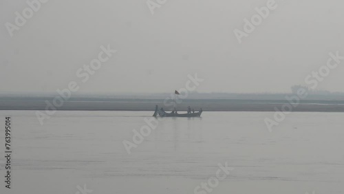 The travle boat in the sea.  People enjoying a ride on a boat. Fishing boats floating on the sea. Fishermans in boat. fishing boat sailing in open waters. man fishing on boat. Slow Motion photo