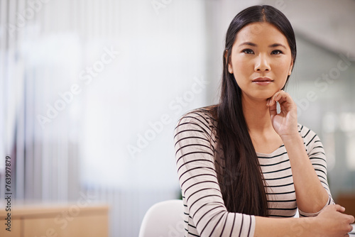 Serious, office and portrait of business Asian woman with confidence, company pride and attitude. Creative startup, professional worker and person in workplace for career, job and working in Japan