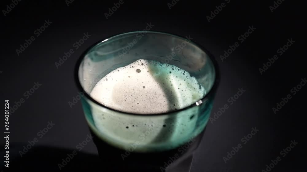 Cola in a glass, soda splash, fizzy liquid, refreshing drink, closeup Cola in a glass, soda splash, fizzy liquid, refreshing drink, closeup