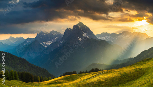mountain landscape at sunrise or sunset  featuring silhouette of majestic peaks