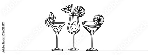 Continuous line drawing. Wineglass with cocktail and lemon. Isolated on white background. Hand drawn vector illustration.