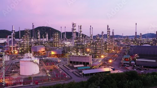Aerial view footage B roll light oil terminal is industrial facility for storage of oil and petrochemical. oil manufacturing products. power electric plant. low light. Footage b roll drone shot 4k.