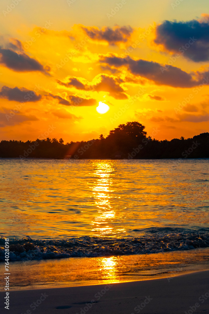 Kuramathi Maldives tropical paradise island sunset view from Rasdhoo.