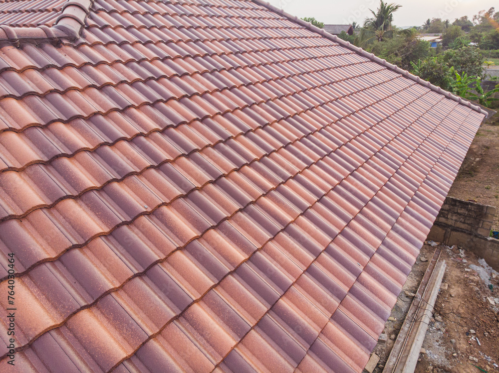 Aerial view modern house roof top building brown brick roof Aerial view modern house roof top building brown brick roof