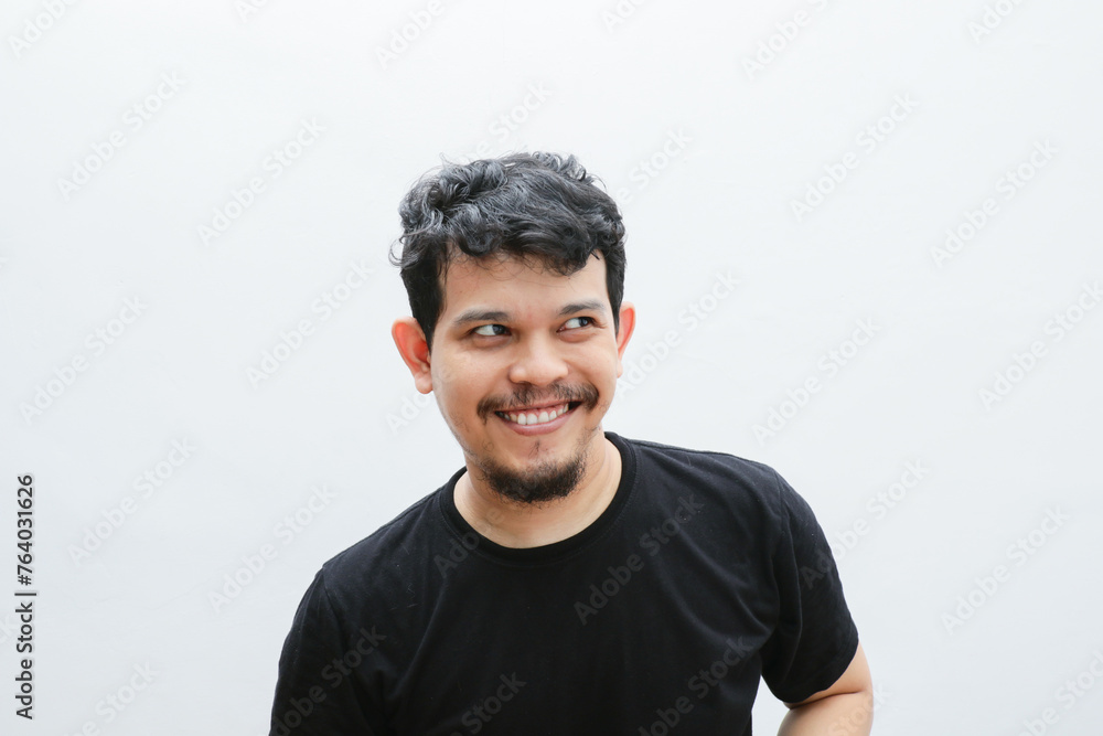 a smiling asian man with a funny face a smiling asian man with a funny face