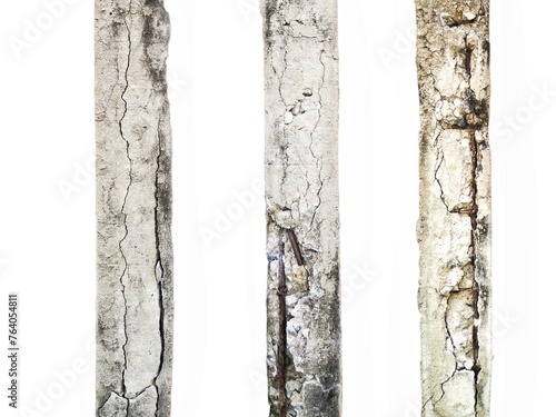 Group of Cracked concrete columns affecting the strength of the building structure isolated on white background.