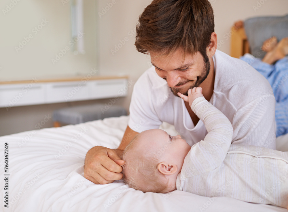 Happy, bonding and baby with father on bed relaxing, playing and resting together at home. Smile, love and young dad laying with girl child, infant or kid in bedroom or nursery at family house. Happy, bonding and baby with father on bed relaxing, playing and resting together at home. Smile, love and young dad laying with girl child, infant or kid in bedroom or nursery at family house.