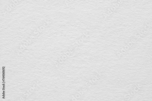 Watercolor paper texture as background, macro image of a white rouge paper pattern