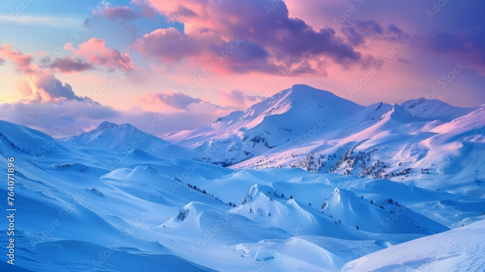 Snow-covered mountain landscape at sunset
