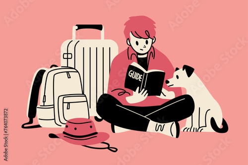 A man and his pet looking at a guidebook while traveling