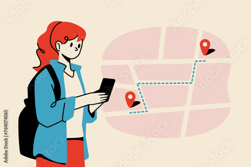 A woman checking the route to her destination on her smartphone