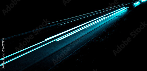 blue car lights at night. long exposure