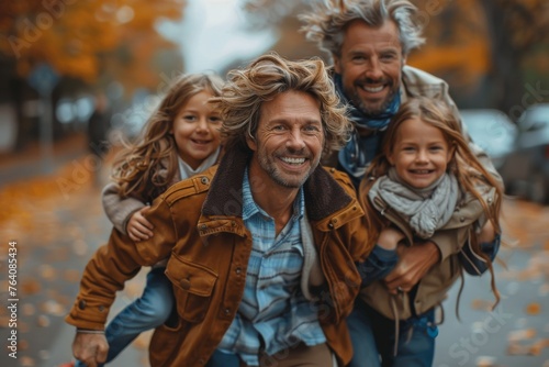 A happy family moment with a father carrying his two daughters on his back during autumn outdoor fun
