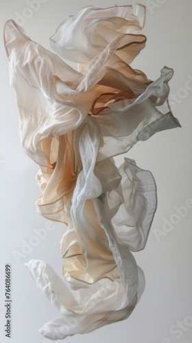 Elegant white fabric in motion on a white background