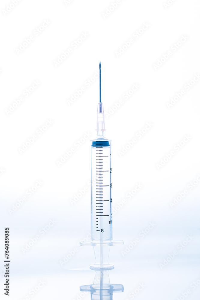 Syringe isolated on white background, macro,Syringe isolated with clipping path Syringe isolated on white background, macro,Syringe isolated with clipping path