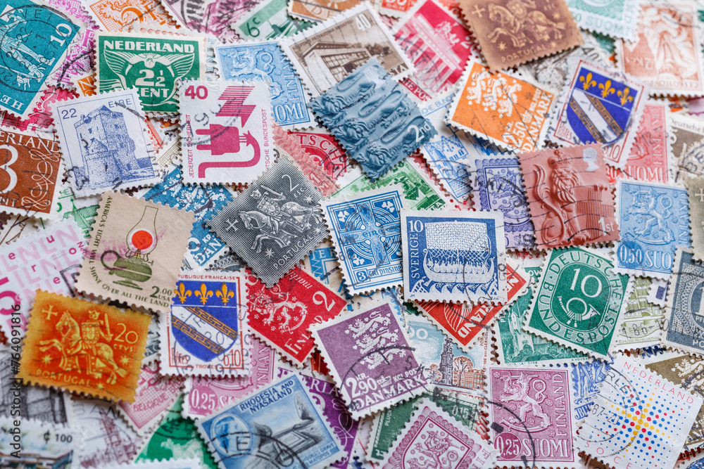 Ukraine, Kiyiv - January 12, 2023 Portugal Postage stamps..Postage stamps.A collection of world stamps in a pile.Postage stamps from different countries and times