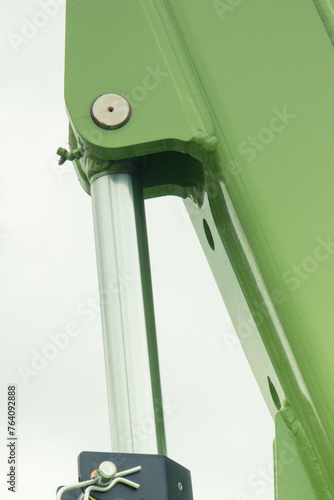 Piston or actuator in green pneumatic or hydraulic machine. Technology