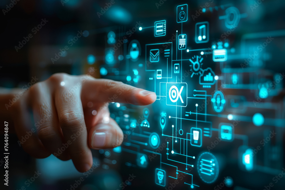 Hand interacting with a futuristic digital interface displaying an Hand interacting with a futuristic digital interface displaying an