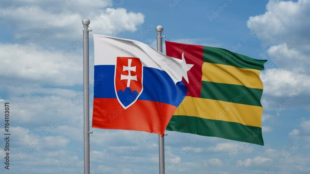 Togo, Togolese Republic and Slovakia two flags waving together, looped video, two country cooperation concept Togo, Togolese Republic and Slovakia two flags waving together, looped video, two country cooperation concept