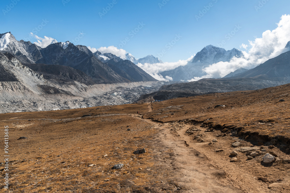 View of Taboche, Cholatse and Lobuche mountains and Khumbu Glacier on the way to Kala Pattar during EBC or Three Passes trekking in Khumjung, Nepal. Highest mountains in the world.