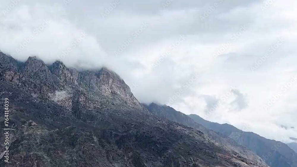 clouds over the mountain Mountain top blue sky dark white clouds clouds over the mountain Mountain top blue sky dark white clouds