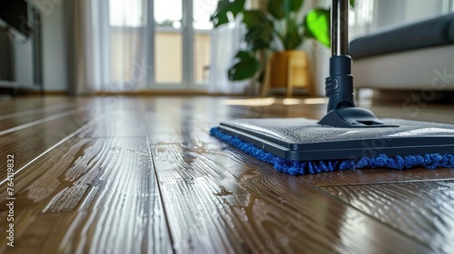 An electric mop and polisher for hardwood floors photo