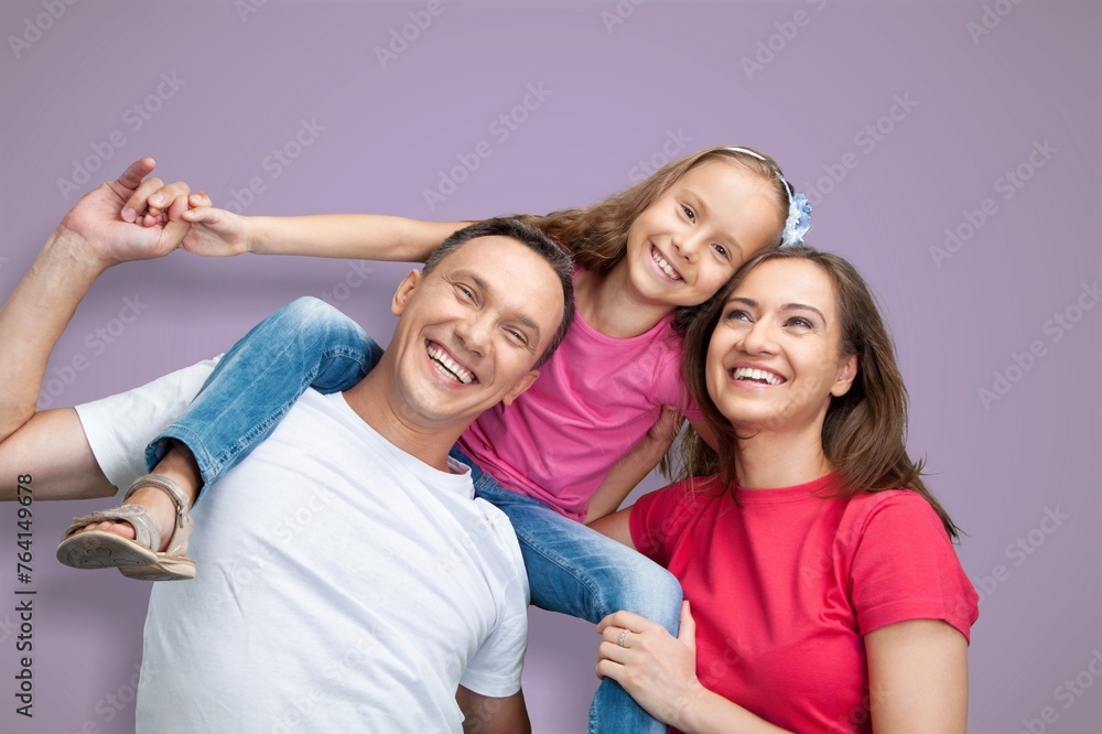 Obraz premium Young cool happy parents with child