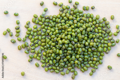 background of mung beans on a wooden table photo