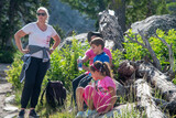A happy caucasian family visiting Yellowstone National Park