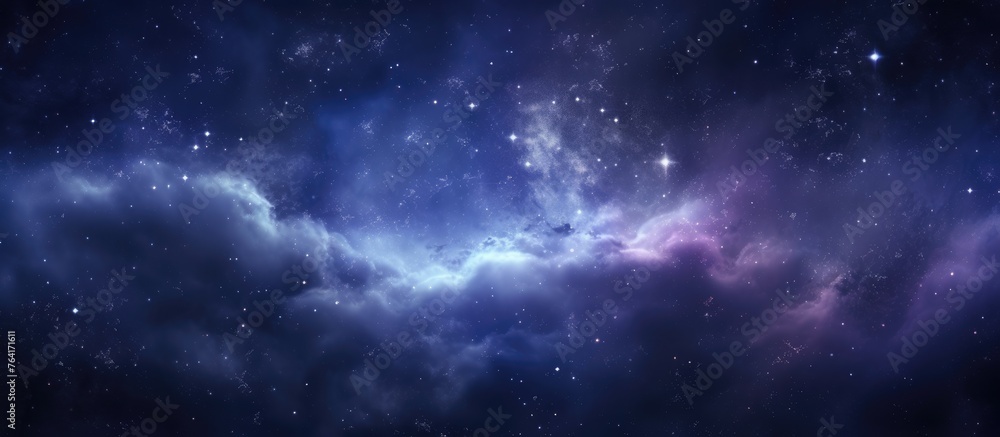 A stunning image of a beautiful galaxy filled with shades of blue and purple, adorned with stars and fluffy clouds
