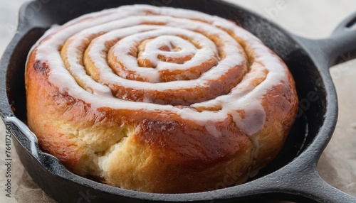 Cinnamon bun for one in a tiny cast iron skillet