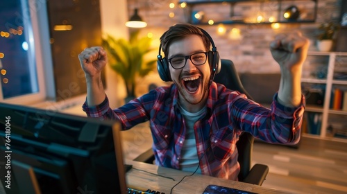 technology, gaming, entertainment, let's play and people concept - happy young man in headset and