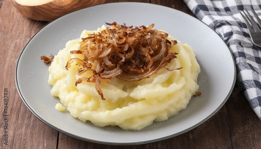 Mashed Potatoes with fried onions in plate