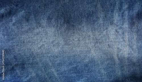 Fotografie Close-up of blue denim jeans fabric texture background