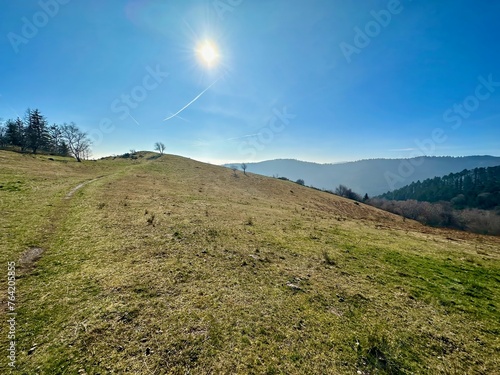 Sunny Trail Towards Ebeneck Summit with the Vosges Mountains in the Distance, Haut-Rhin, Alsace photo