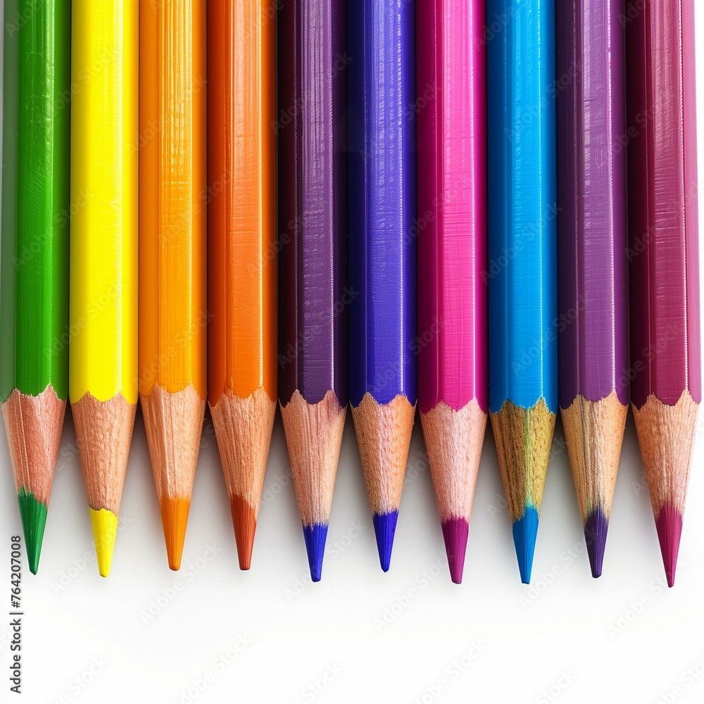 Vibrant Rainbow Colored Pencils Lined Up on White Background Vibrant Rainbow Colored Pencils Lined Up on White Background