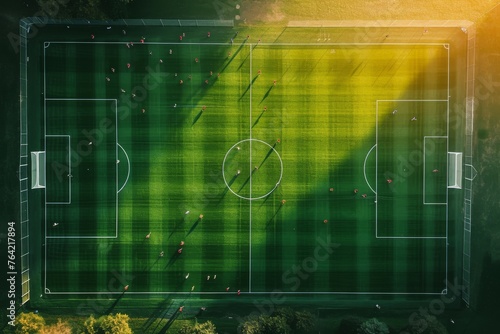 An overhead shot of a soccer field, showcasing the pitch, goalposts, and players competing in a match, An aerial viewpoint of a soccer field during a high-intensity match, AI Generated