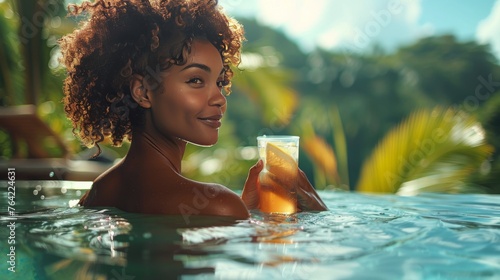woMan Relaxing in Pool With Drink