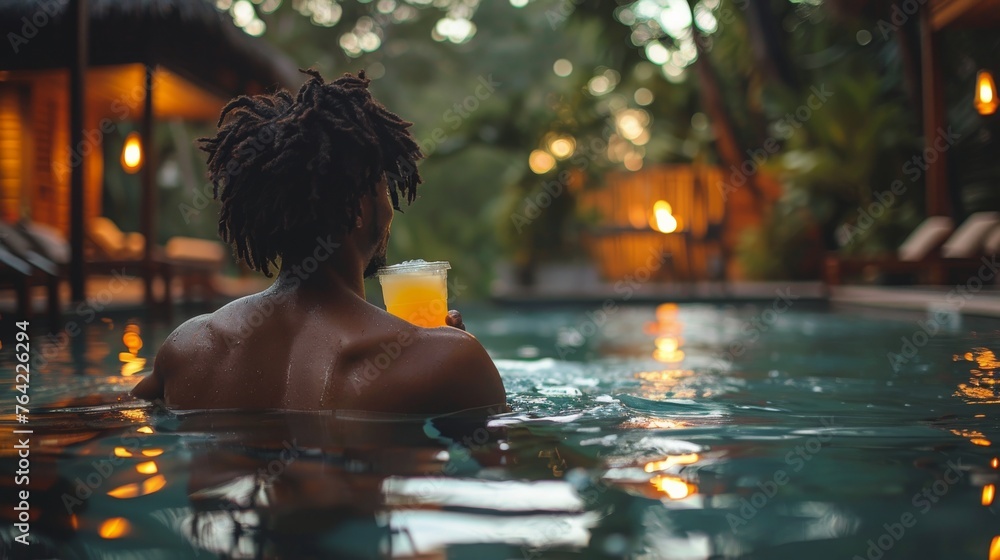 Man Relaxing in Pool With Drink Man Relaxing in Pool With Drink