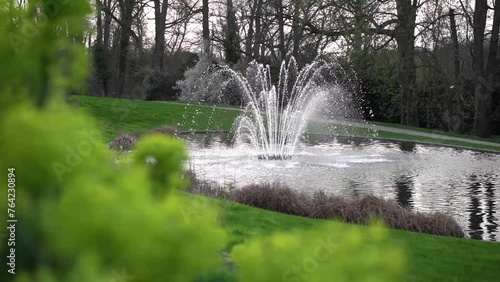 fountain on the lake in the park