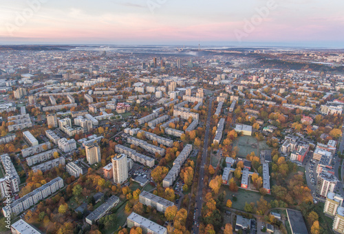 Zirmunai District in Vilnius City, Lithuania. Autumn Leaves Color. Morning Golden Hour Light.