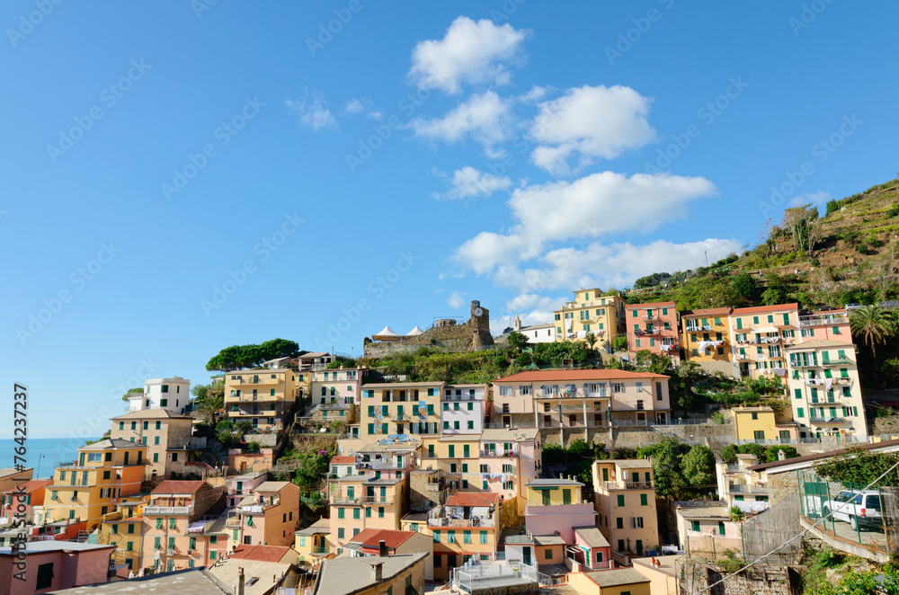View of the famous seaside villages of Cinque Terre. Colorful houses and buildings. Fishing village. Touristic destination. Unesco world heritage site. 