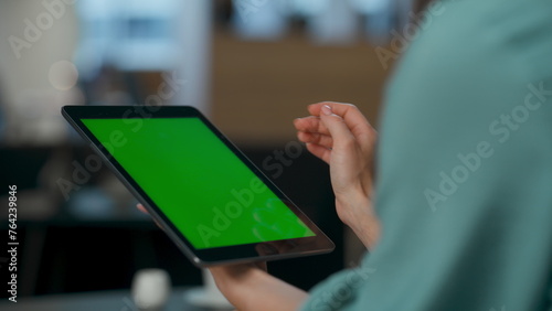 Arms using green screen pad at lounge closeup. Woman touching mockup computer