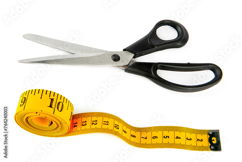 Measuring tape and tailor scissors isolated on white. Collage.