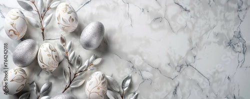 Background with Easter eggs and silver leaves decoration
