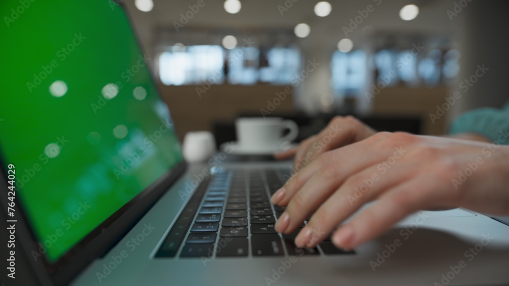 Executive arms pushing buttons at green screen computer. Woman typing laptop Executive arms pushing buttons at green screen computer. Woman typing laptop