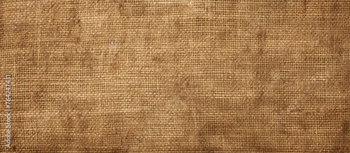 A hole in brown fabric close-up
