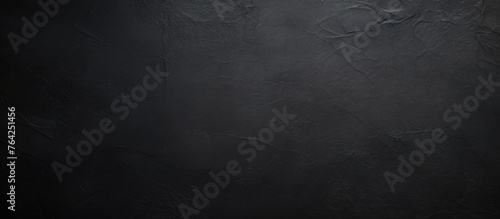 Close-up of black wall with silver knife and fork