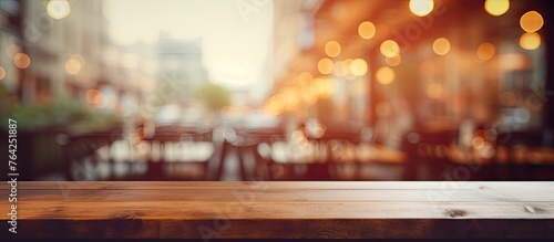 Wooden table with city background blur © Ilgun